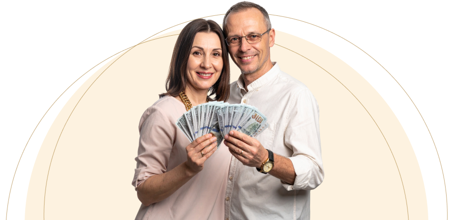 Happy couple holding cash