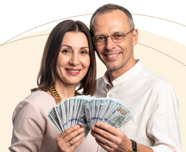 Happy couple holding cash